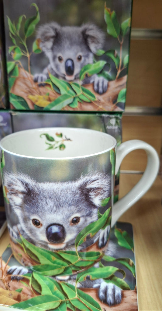 Mug with a koala design on a matching coaster