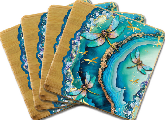 Set of four decorative coasters with dragonfly design on a floral border