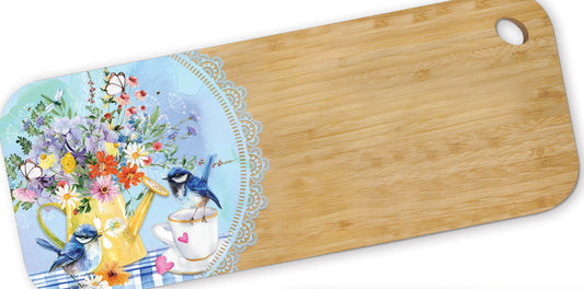 Bamboo serving platter with floral design and blue birds on a white background